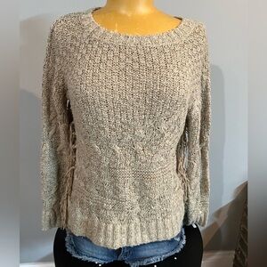 Knitted sweater with fringes